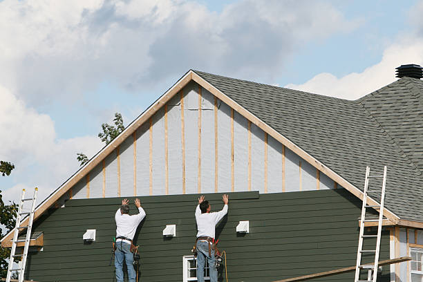 Professional Siding Repair technician working in Howard, PA